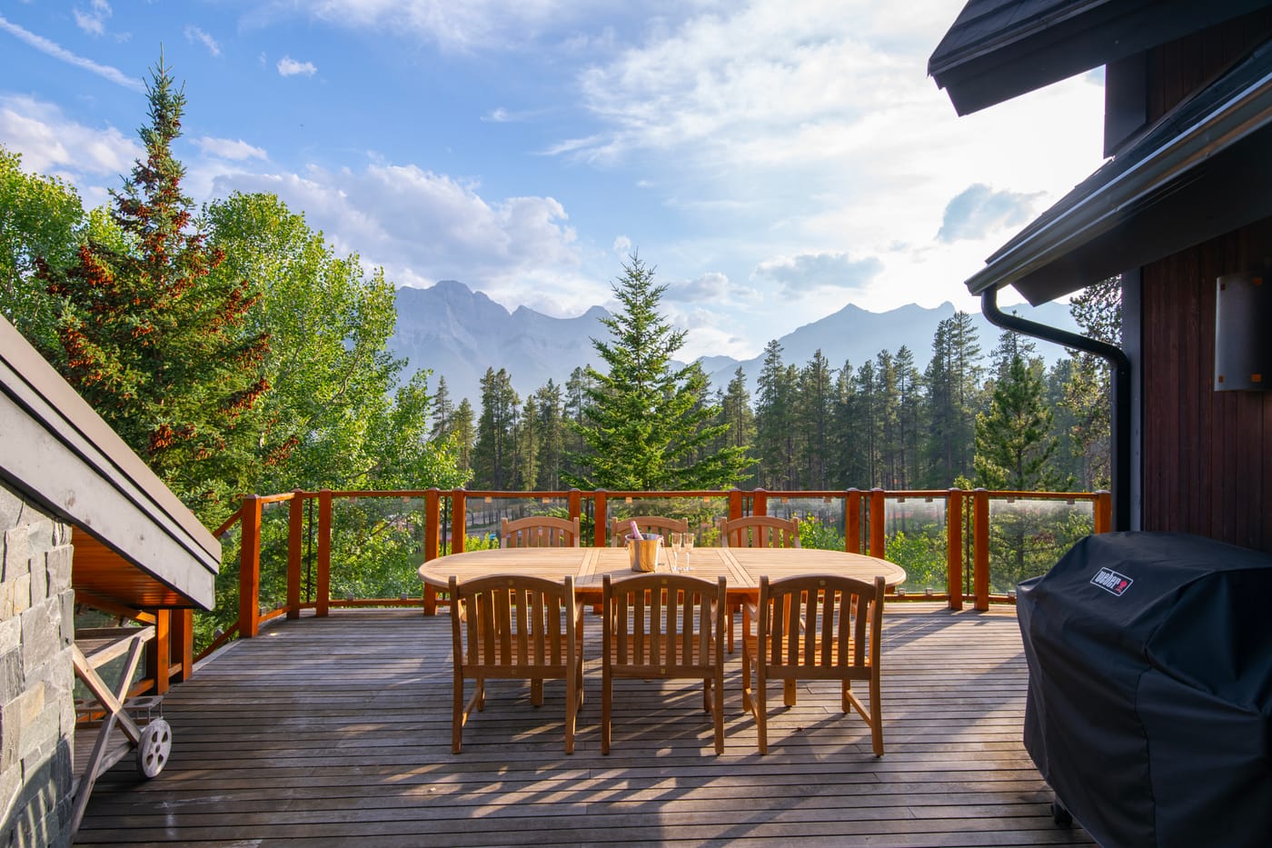 Covered deck dining with valley views