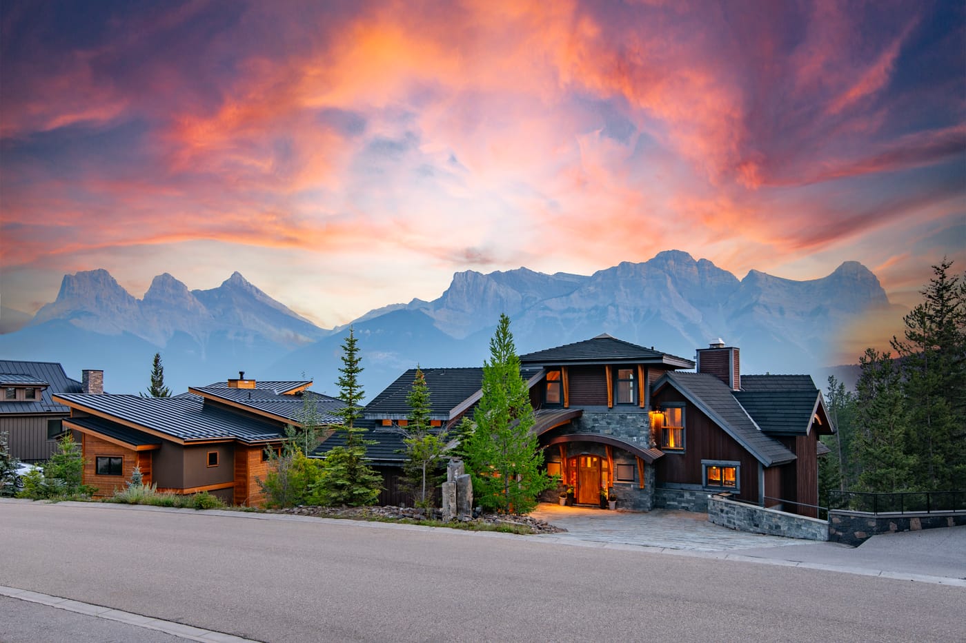 The lodge exterior at twilight in the Bow Valley