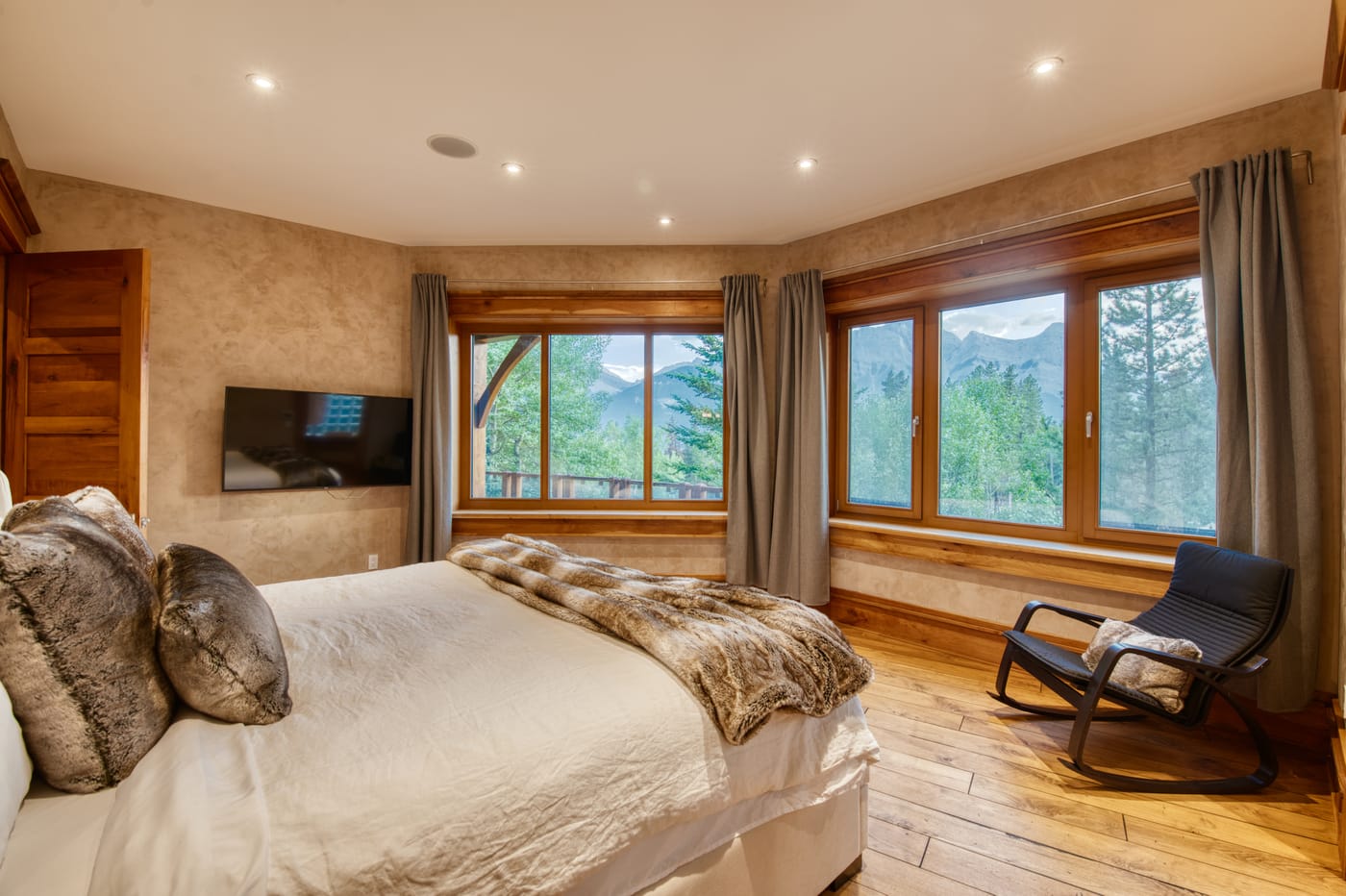 Primary bedroom with a mountain outlook